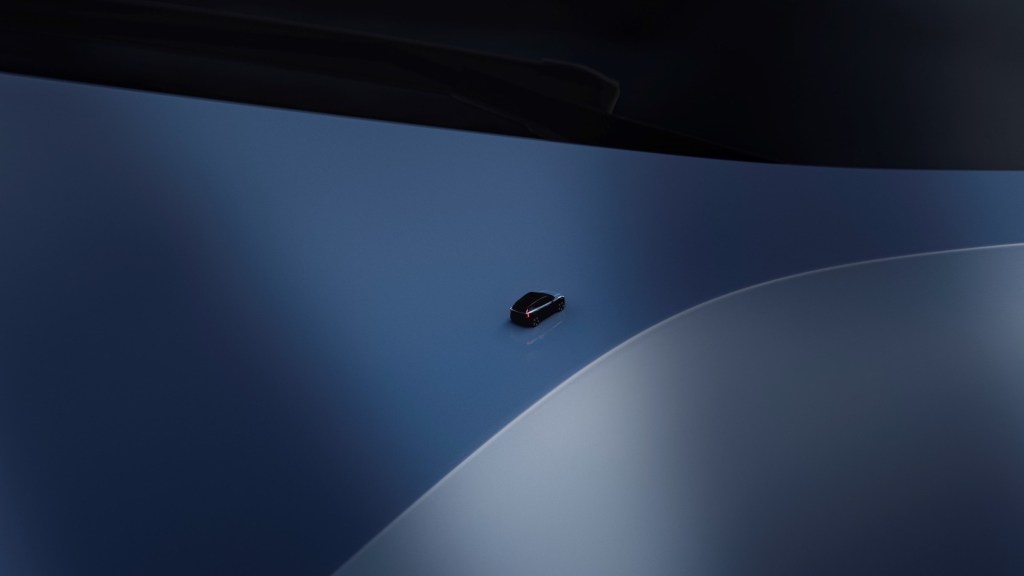 A promotional image for Volvo's upcoming EX30 electric SUV.