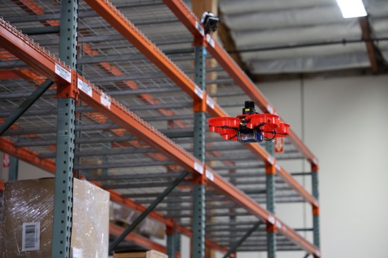 drone flying thru warehouse