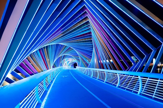 Rainbow bridge representing technology and diversity.