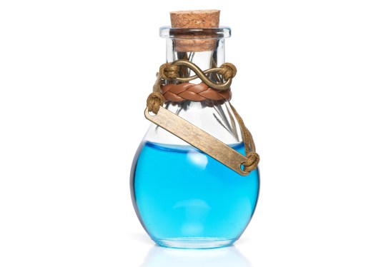 ancient bottle of a solution or remedy for all difficulties or diseases. Isolated on white