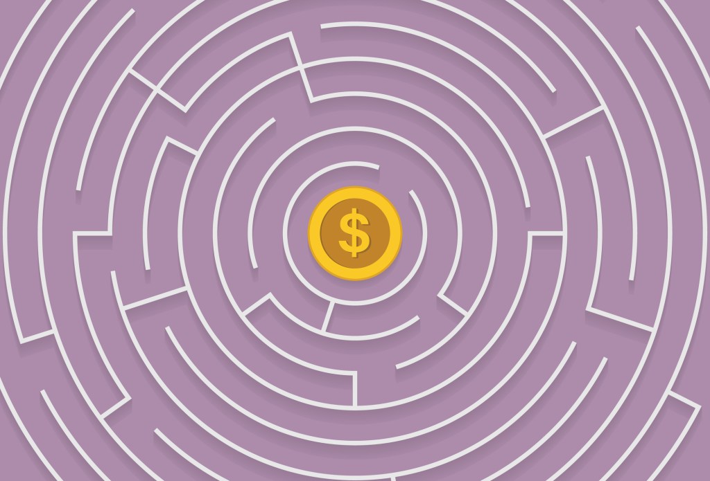 maze with a US dollar coin in the middle