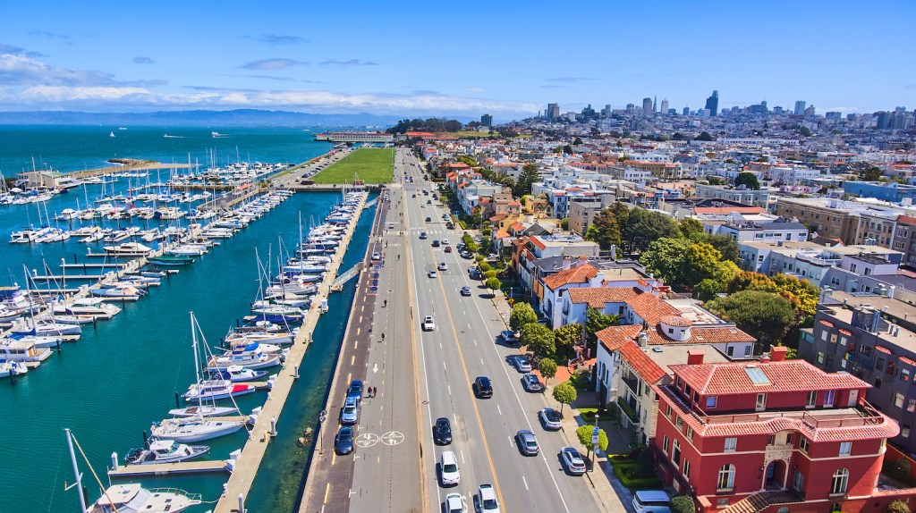 Image of Aerial over harbor and colorful beach homes in San Francisco, California