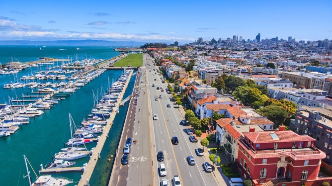 Image of Aerial over harbor and colorful beach homes in San Francisco, California