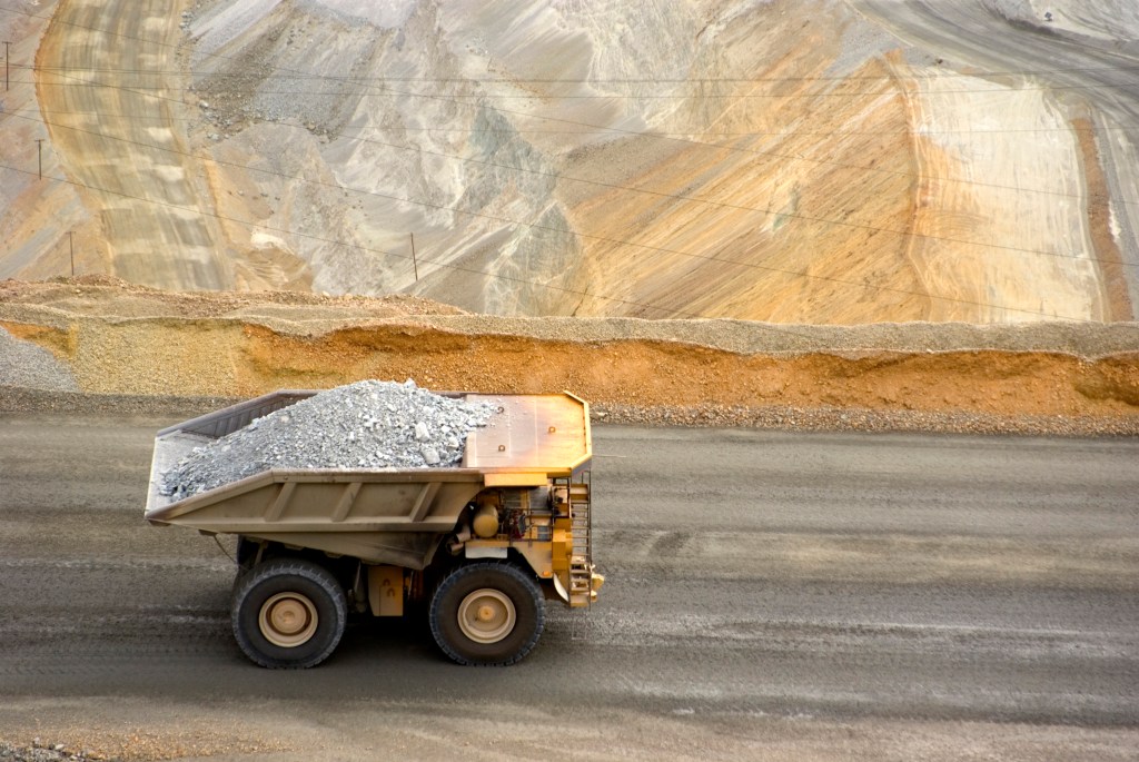 Dump truck hauls ore in a Utah copper mine