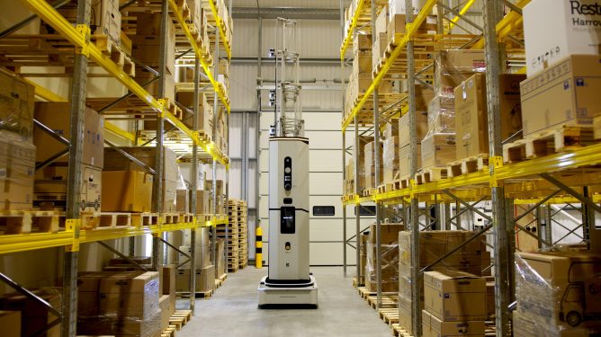 Dexory robot scanning racks