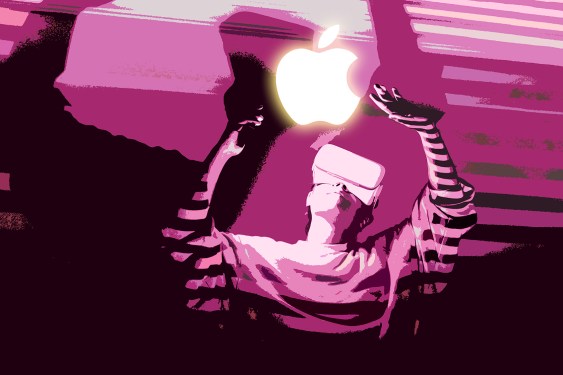 Apple logo floats above a person wearing a VR headset
