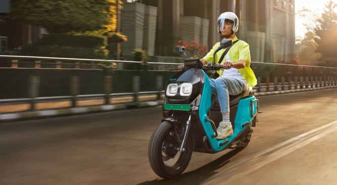 Person riding a scooter