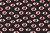 a pattern of red eyes on a darkened background