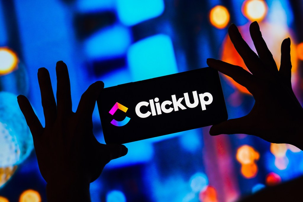 ClickUp logo on a smartphone