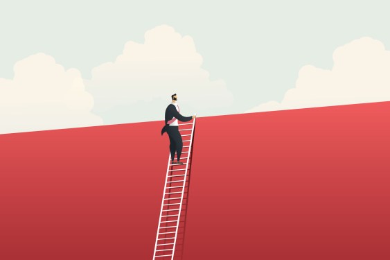 Business man slowly climbing a ladder and able to see over the top of the wall it's leaning against.