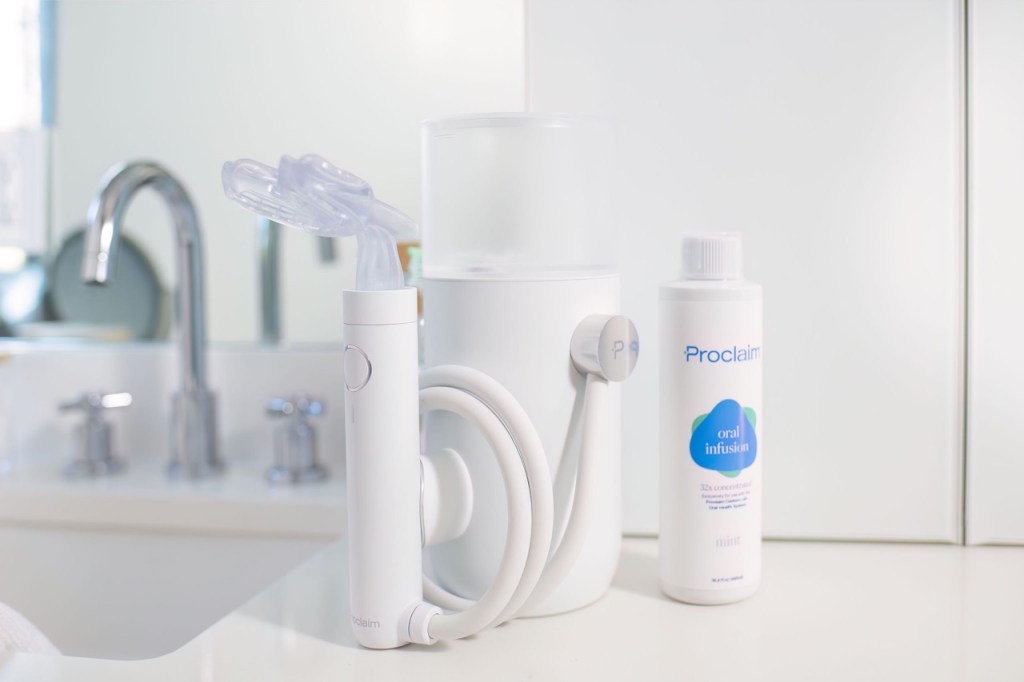 Proclaim’s Custom-Jet Oral Health System sitting on a sink