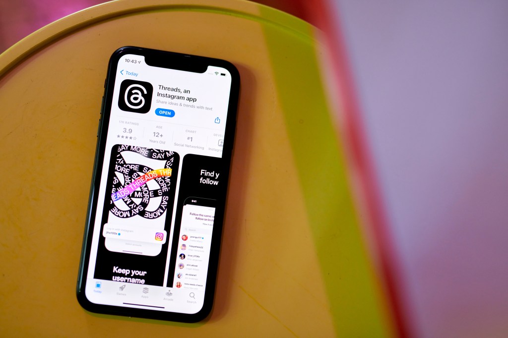 The Threads application for download in the Apple App Store on a smartphone.