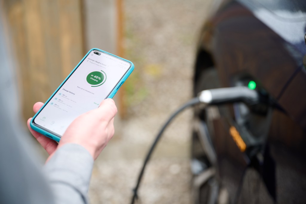 Person monitoring their EV.energy dashboard