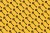 a pattern of antique keys on a yellow mustard background