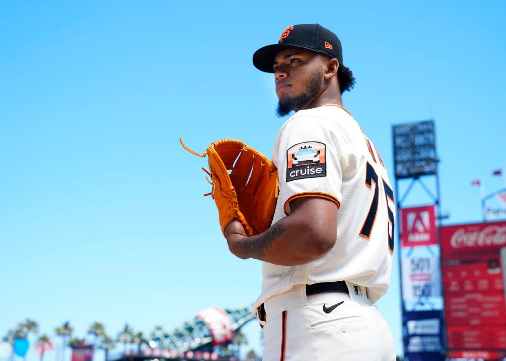 SF Giants player sporting a Cruise ad/patch on the left sleeve of his game jersey