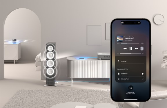 A rendering of the Eve Play streaming box connected to a stereo system with an iPhone showing the audio output screen.