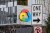 Google Cloud logo on the side of.a building with a one way sign in the foreground.
