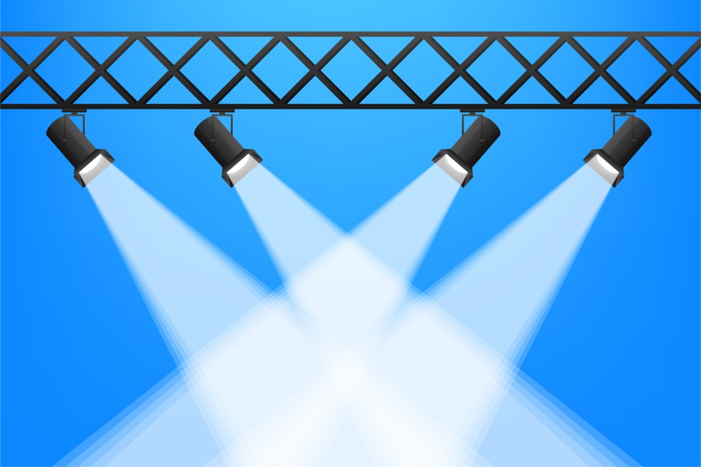 Graphical image of four theater lights focused on a similar spot.