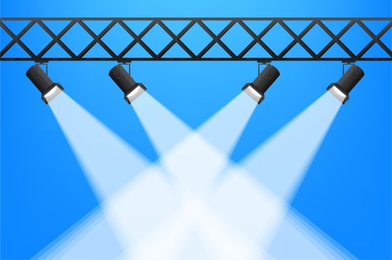 Graphical image of four theater lights focused on a similar spot.