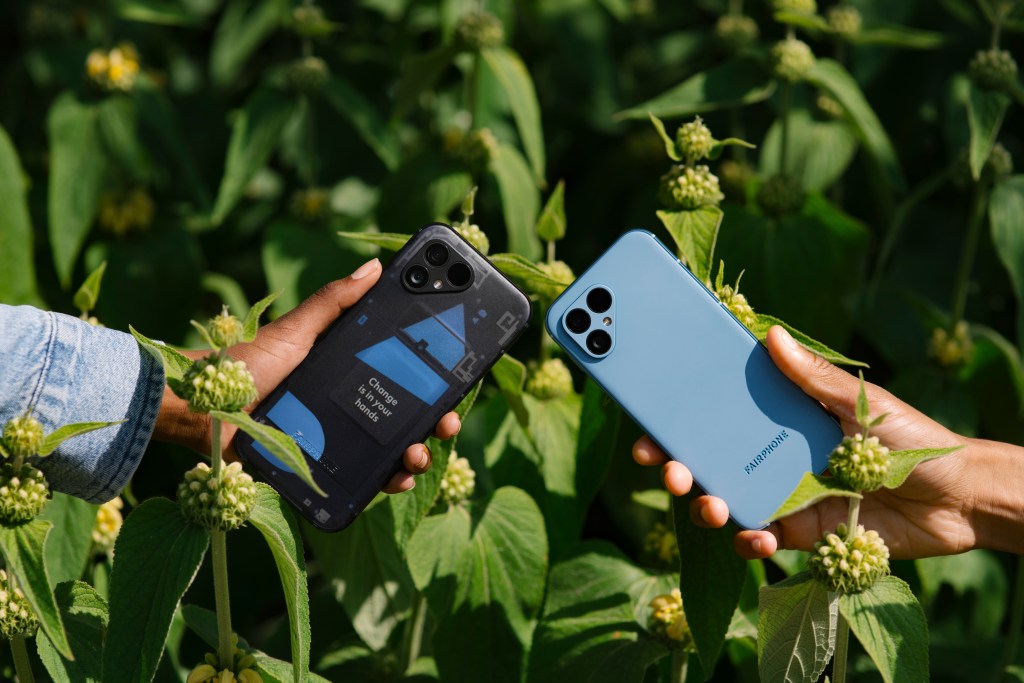 two Fairphone 5 smartphones held side by side