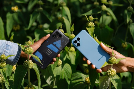 two Fairphone 5 smartphones held side by side