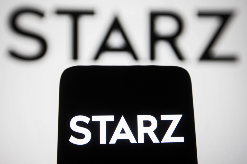 In this photo illustration, the logo of Starz, a cable and