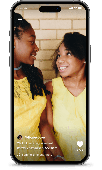 An example of the Betweened feed, featuring two young girls and captioned, "We look amazing in yellow! #bestfriendsforever." 