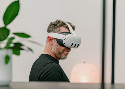 Man wearing a Meta Quest 3 headset