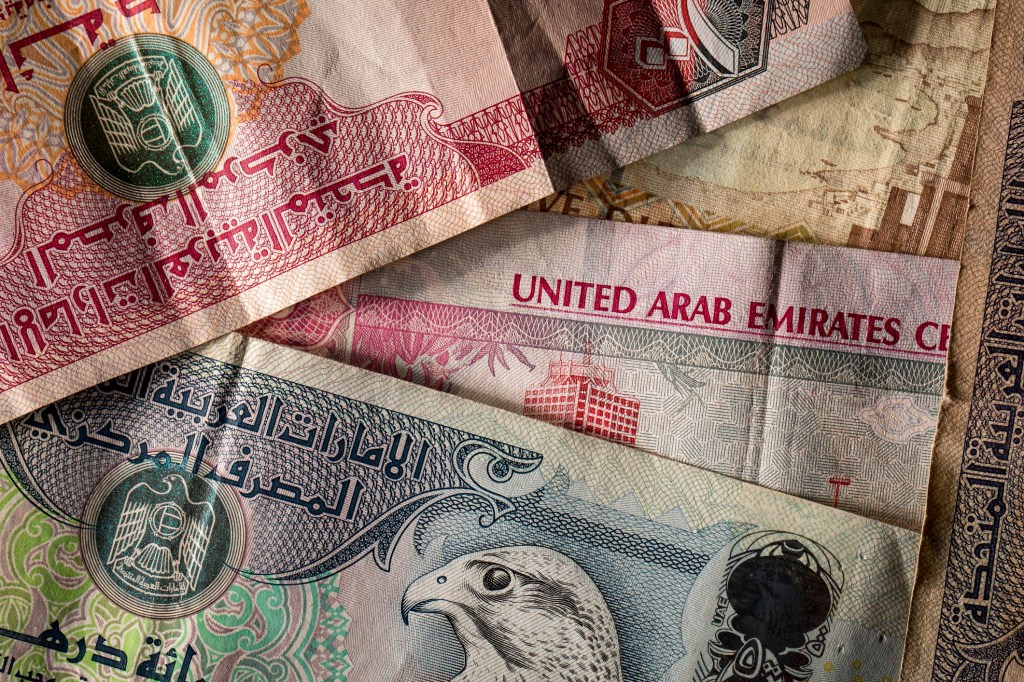United Arab Emirates dirham banknotes issued by the United Arab Emirates Central Bank. Photographer: Jason Alden/Bloomberg