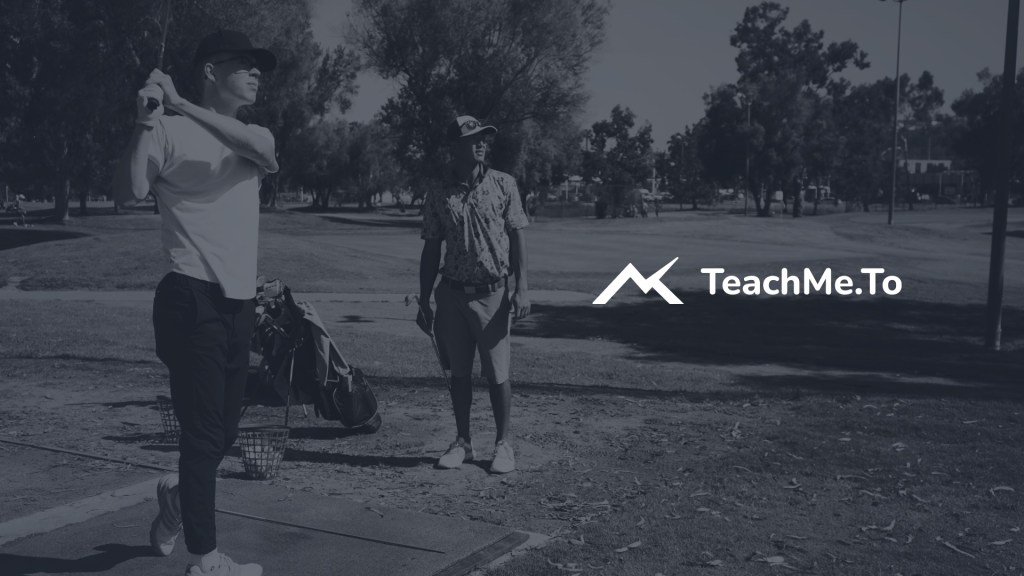 golf instructor with student