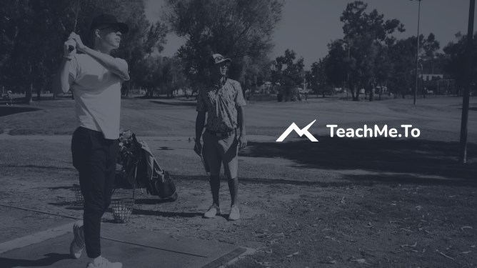 golf instructor with student