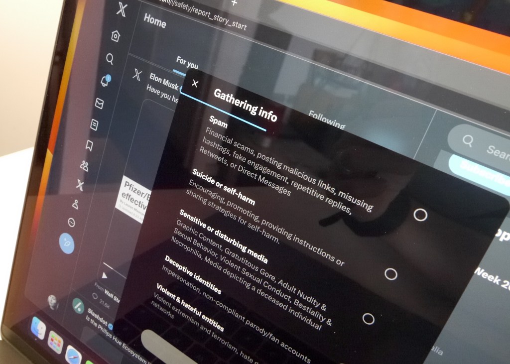X, formerly Twitter, displaying post reporting options