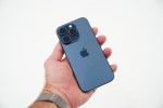 back of blue new iPhone 15 pro with camera