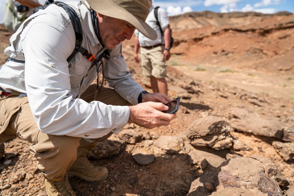Michael Barth, Voiijer Founder and CEO, hiking in rocky terrain
