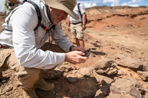 Michael Barth, Voiijer Founder and CEO, hiking in rocky terrain