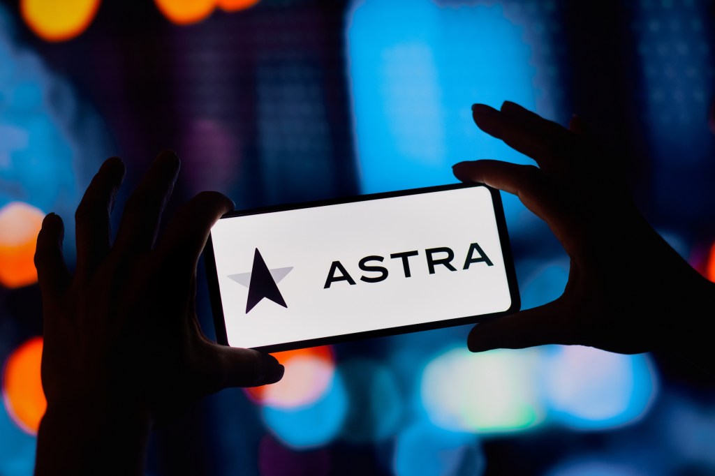 In this photo illustration, the Astra Space logo is displayed on a smartphone screen.