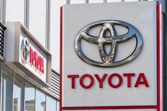 Toyota sign displayed outside a Tokyo showroom.