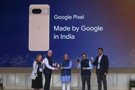 Rick Osterloh, Google's senior vice president, Devices & Services, Ashwini Vaishnaw, Minister for Information Technology and Sanjay Gupta, Vice President, Google India, hold Google Pixel phones in their hands as they announce Google's plan to manufacture Pixel smartphones in India.