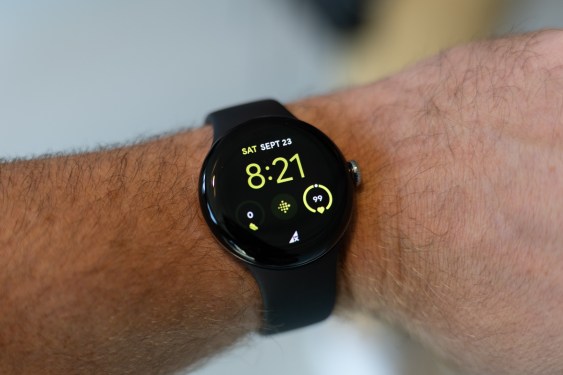 Google Pixel Watch 2 worn on the wrist, showing the time and activity