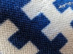 Macro shot of blue and white fabric, taken with a Pixel 8