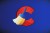 a screenshot of CCleaner's pixelated logo on a darkened blue background.