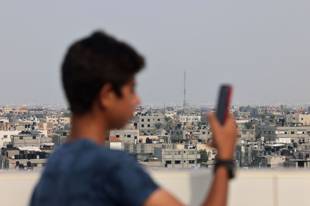 An antenna of a communications tower that relays phone and internet signals is pictured in Rafah, in the southern Gaza Strip on October 28 , 2023, amid the ongoing battles between Israel and the Palestinian group Hamas. Internet access and the phone network were completely cut across the Gaza Strip on October 28, nearly three weeks after Israel began bombarding the enclave following an armed attack by Hamas militants that Israeli officials say killed at least 1,400 people, mostly civilians. (Photo by MOHAMMED ABED / AFP) (Photo by MOHAMMED ABED/AFP via Getty Images)