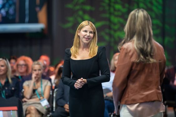 New Slack CEO Denise Dresser speaking at a Salesforce event.