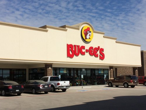 A Buc-ee's location against a dark blue sky