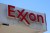 A close-up of a red Exxon sign at a gas station in Florida.