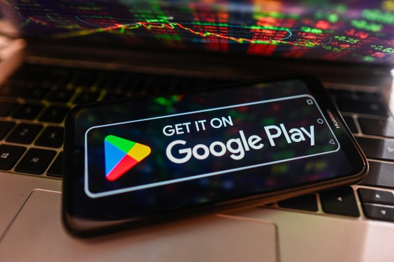 In this photo illustration, a Google Play logo is displayed