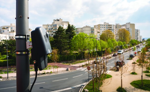 Upciti camera on pole overlooking urban setting
