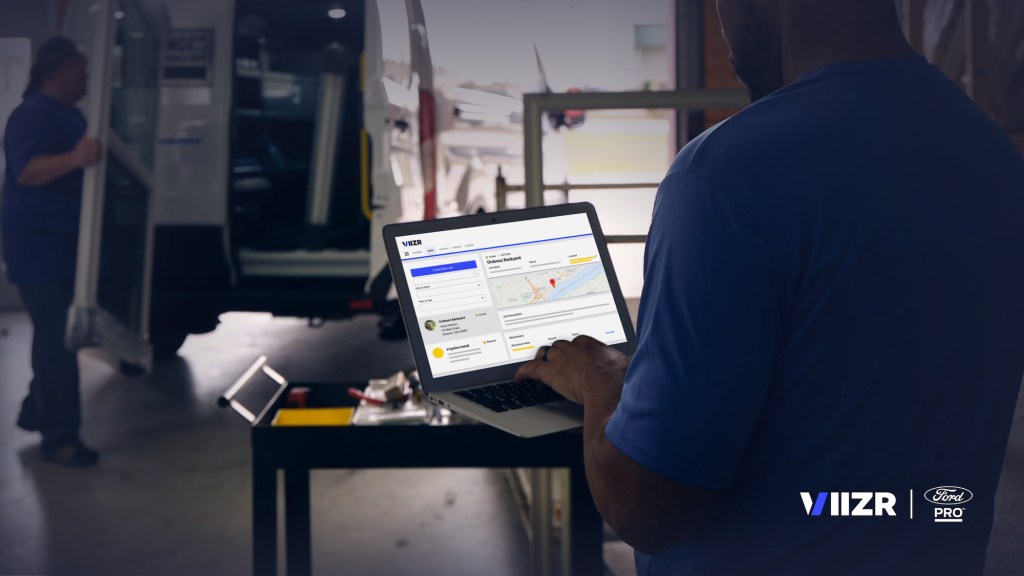 VIIZR - Ford Pro; person seated, using laptop