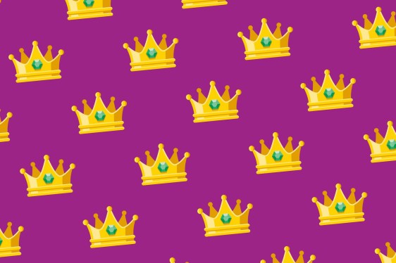 A seamless pattern of yellow jeweled crowns on a purple background