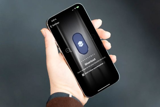 hand holding an iPhone 15